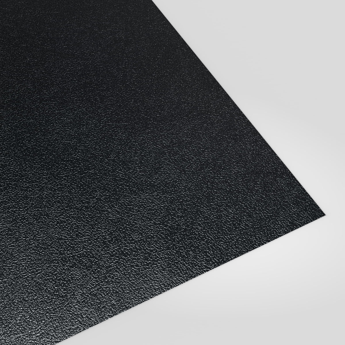 Flat metal sheet in Anthracite (dark charcoal) PVC Plastisol, grained finish, angled studio view