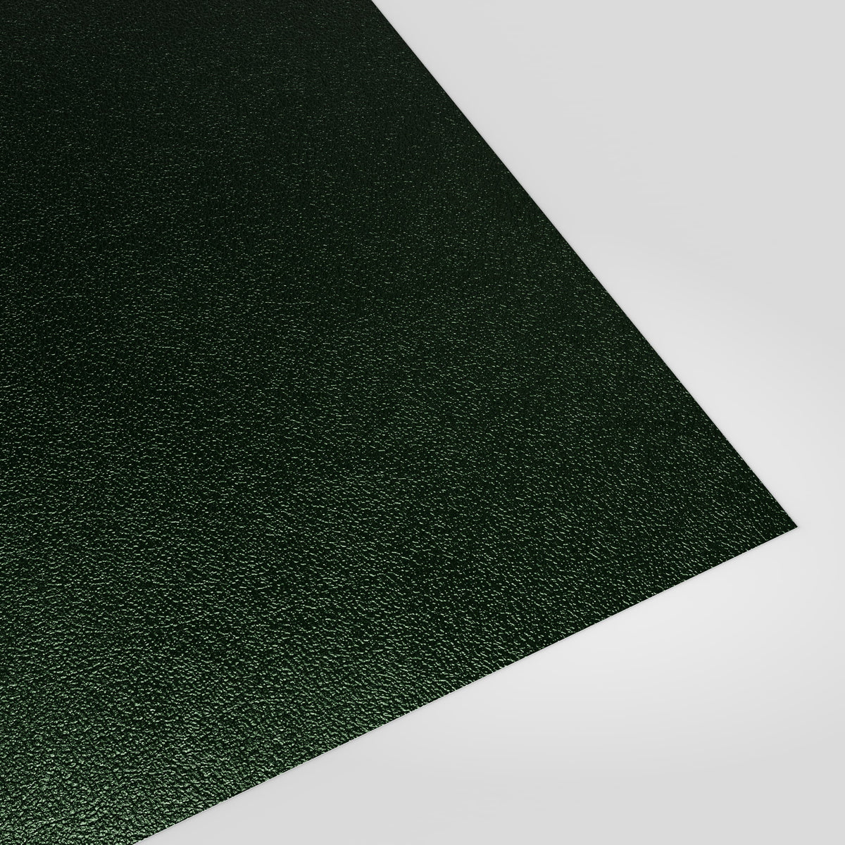 Flat metal sheet in Juniper Green (deep green) PVC Plastisol, grained finish, angled studio view