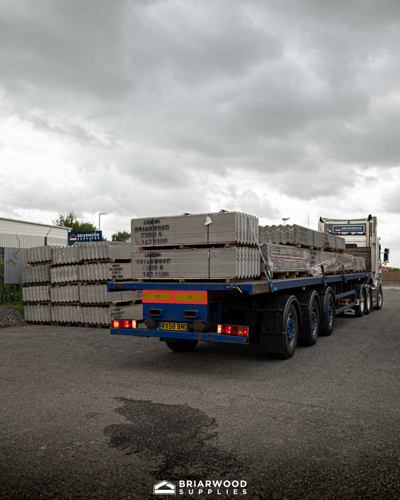 A lorry filled with lots of Big 6 Fibre Cement Sheets