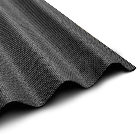 Corrugated bitumen roofing sheet in black, close-up of the texture and profile