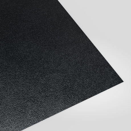 Flat metal sheet in Anthracite (dark charcoal) PVC Plastisol, grained finish, angled studio view