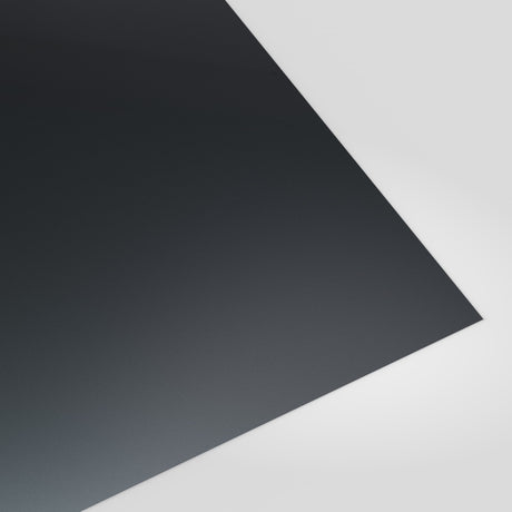 Flat metal sheet in Anthracite (dark charcoal) polyester, smooth finish, angled studio view