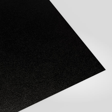 Flat metal sheet in Black PVC Plastisol, grained finish, angled studio view