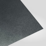 Flat metal sheet in Merlin Grey (mid blue-grey) PVC Plastisol, grained finish, angled studio view