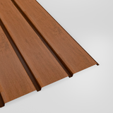 Plank profile woodgrain steel cladding sheet in Walnut (reddish brown), studio view