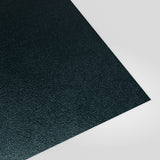 Flat metal sheet in Slate Blue (dark blue-grey) PVC Plastisol, grained finish, angled studio view