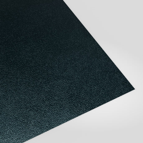 Flat metal sheet in Slate Blue (dark blue-grey) PVC Plastisol, grained finish, angled studio view