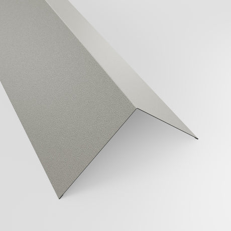 90 degree external corner barge flashing in Goosewing Grey (pale grey) PVC Plastisol, grained finish, 150 x 150 mm, studio view