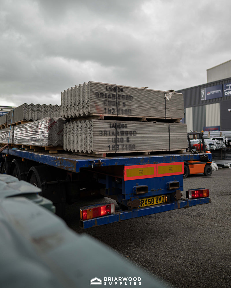Lorry transporting roofing sheets from Briarwood Supplies